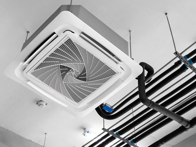 Ceiling mounted cassette type air conditioner.